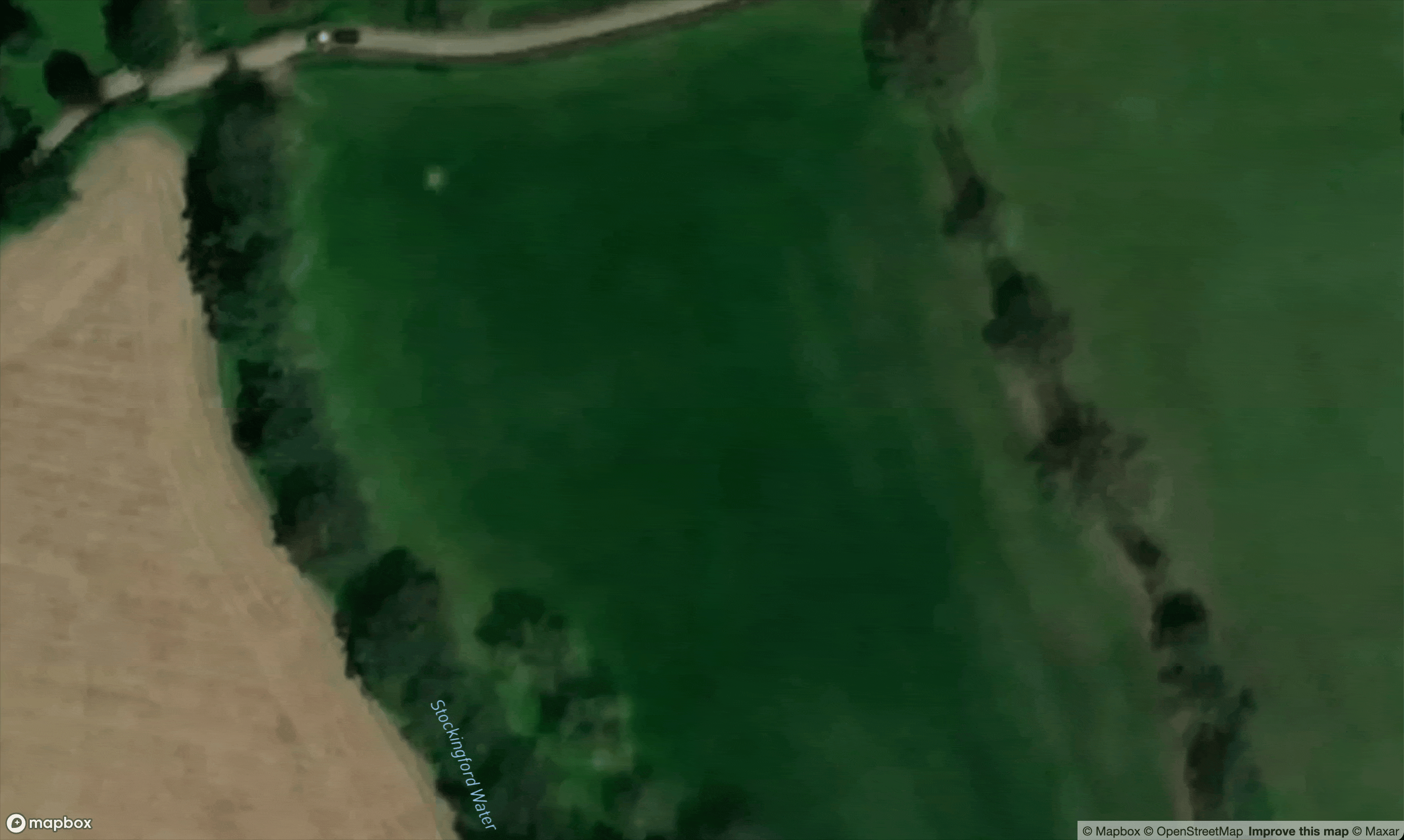 A whole load of pins representing trees appear one at a time on a map showing a field which has recently been planted with new trees.